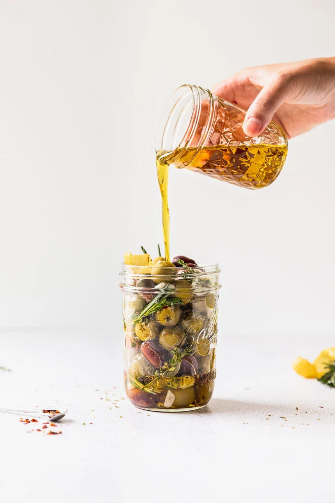 Oliwki w oliwie z ziołami (250g)